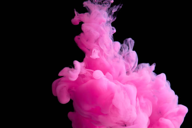 istock Fluid art. Abstract background. Pink flow on black. 1302760285