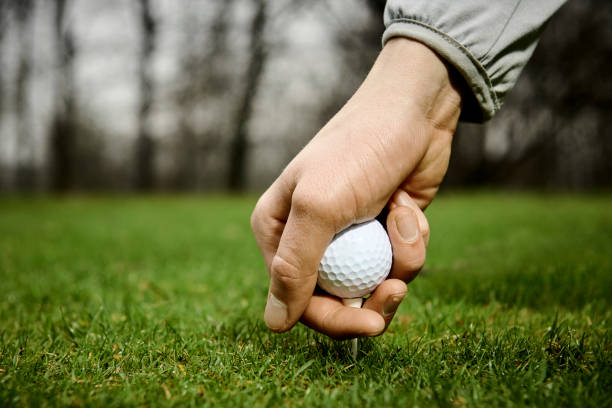 istock Golf ball on the green 1302762916