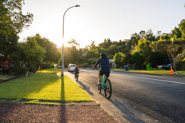istock Mother with kids doing a bike ride. 1302762989