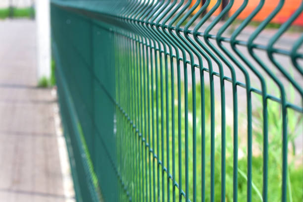 istock Green steel wire fence with rods 1302766848