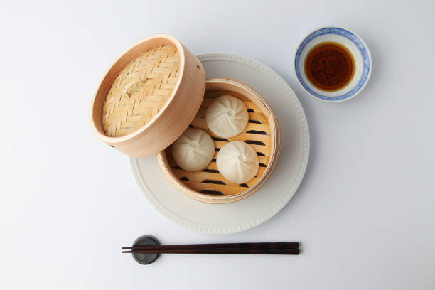 istock xiaolongbao Chinese steamed bun mantou dumpling isolated on white background 1302772394
