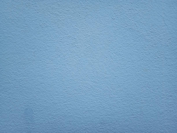 istock Smooth surface blue cement wall background in vintage style 1302775273