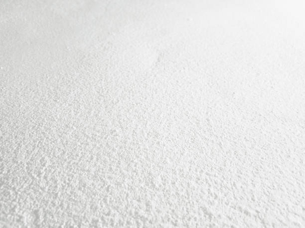 istock White cement wall background in vintage style for graphic design 1302776139