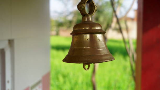 istock Bronze temple Ring bell for powerful sound. Handmade brass ring bell in temple with blurred background. 1302780249