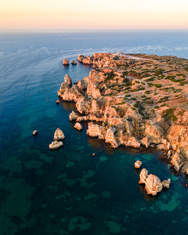 Aerial view of cliffs with rock formations at Ponta da Piedade