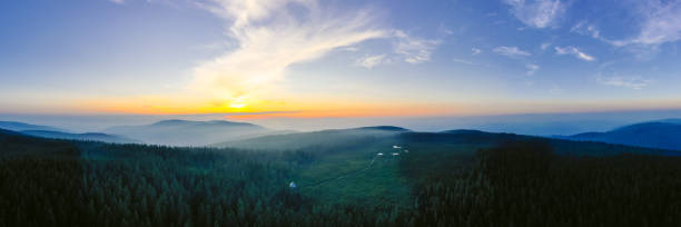 istock Rural landscape with mountains during sunset 1302783644