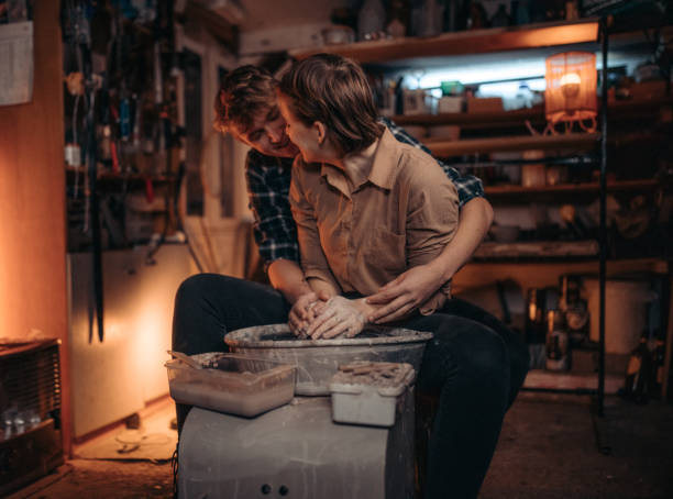 istock Couple working together in pottery 1302783930