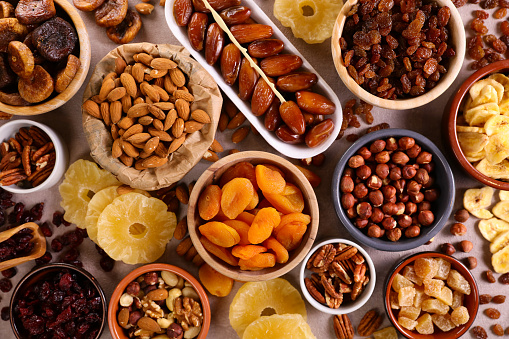 assorted nuts and dried fruit background-organic food