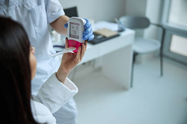 istock Patient receiving a spirometer from the physician hands 1302784427