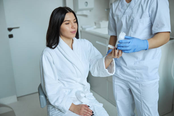 istock Dark-haired woman getting ready for a spirometry test 1302784428
