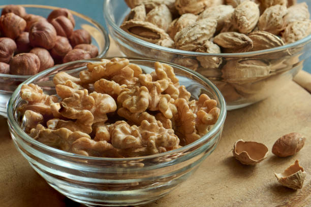 istock Walnuts, hazelnuts and almonds, healthy diet, macro 1302785537