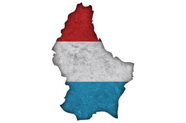istock Map and flag of Luxembourg on weathered concrete, 1302785980