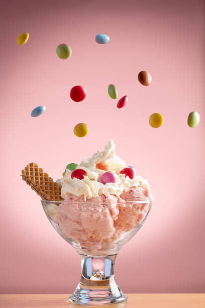 istock Prepared Strawberry Ice-cream Sundae with floating sweets 1302787313