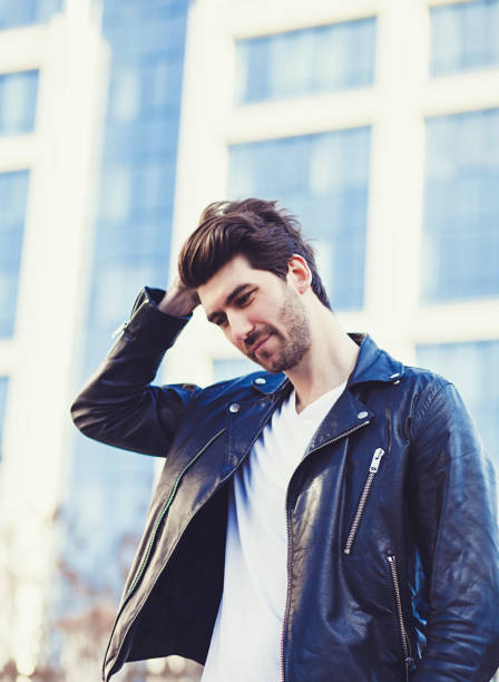 istock fashion model wearing leather jacket 1302789184