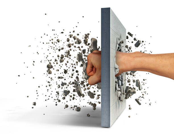 istock Fist hits the concrete wall, which shatters into many pieces, 3d illustration 1302790902