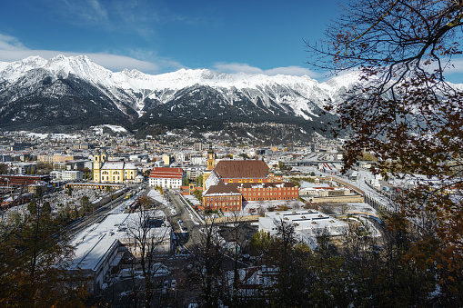 Aerial view of Innsbruck with Wilten Abbey and Alps mountains - Innsbruck, Tyrol, Austria