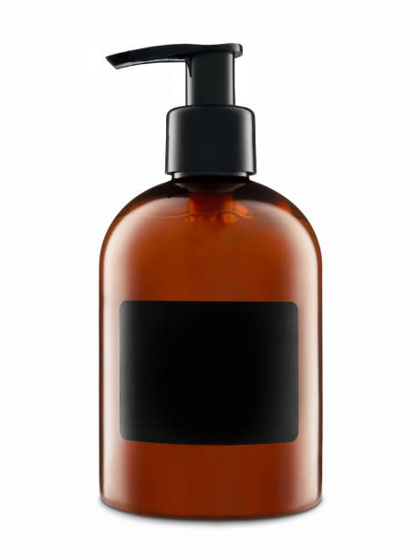 istock Dark plastic pump bottle with blank black label for mock-up. 1302793289
