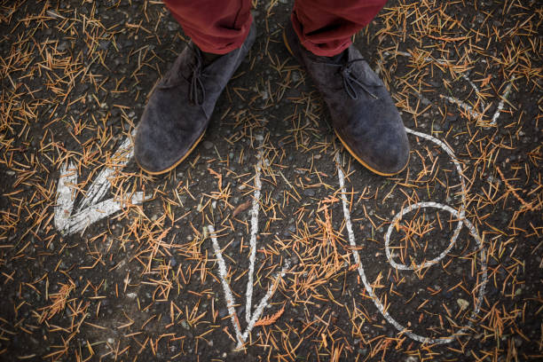 istock Men's shoes with arrows 1302794205