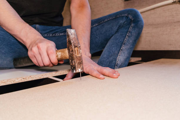 istock master worker man assembling furniture bed components repair tools 1302794850