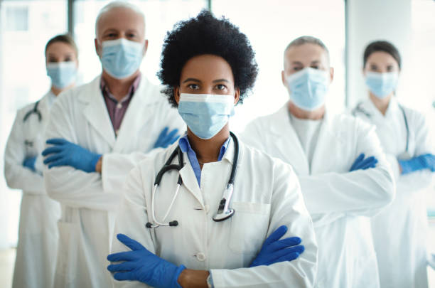 istock Standing together against pandemic. 1302794854