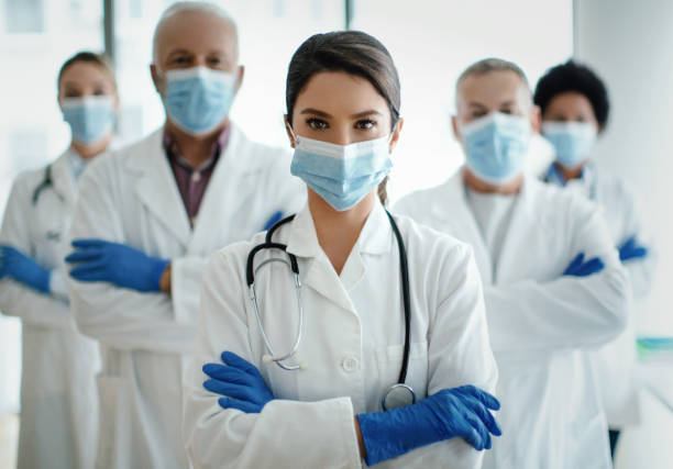 istock Standing together against pandemic. 1302794959