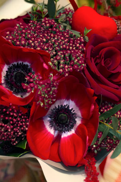 istock Red anemone in a bouquet 1302795625
