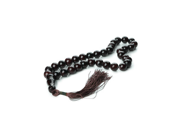 istock Rosary or prayer beads, isolated on white background 1302796914