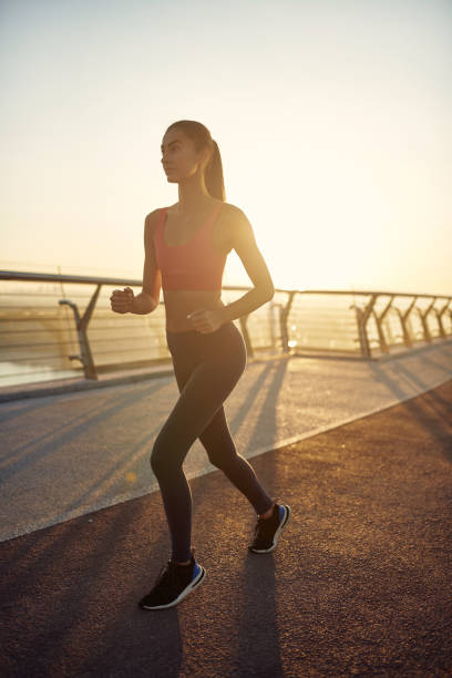 istock Girl doing sport outdoors in the morning 1302800882
