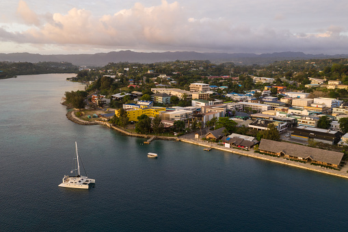Port Villa waterfront and business district with catamaran in Vanuatu capital city in the south Pacific