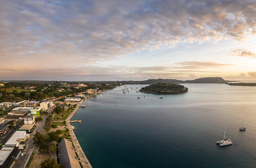 Aerial panorama of Port Vila city and the Iririki island in Vanuatu capital city at sunset.