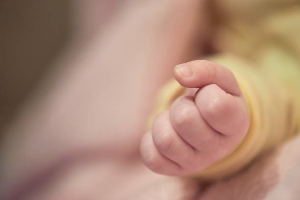 istock cute little newborn baby smilling 1302803571