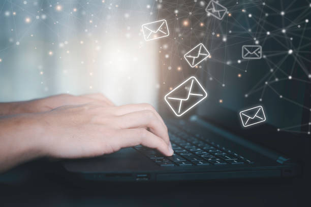 istock Closeup Businessman hand using computer laptop with email icon and connection line. 1302804750