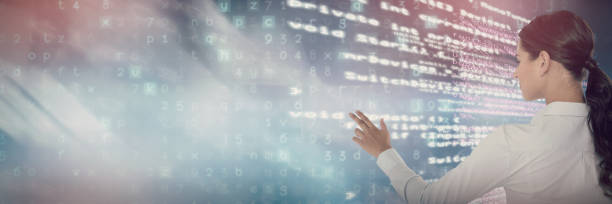 istock Composite image of female executive pressing an invisible virtual screen 1302806978