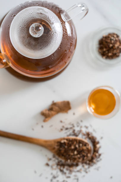 istock Top shot of spiced rooibos tea preparation in kitchen 1302807068