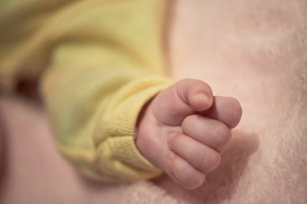 istock cute little newborn baby smilling 1302807253