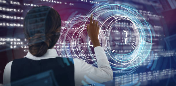 istock Composite image of rear view of businesswoman touching invisible interface 1302807699