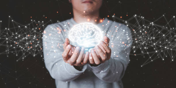 istock Businessman holding glowing  drawing brain and connection line, creative thinking ideas and innovation concept. 1302808624