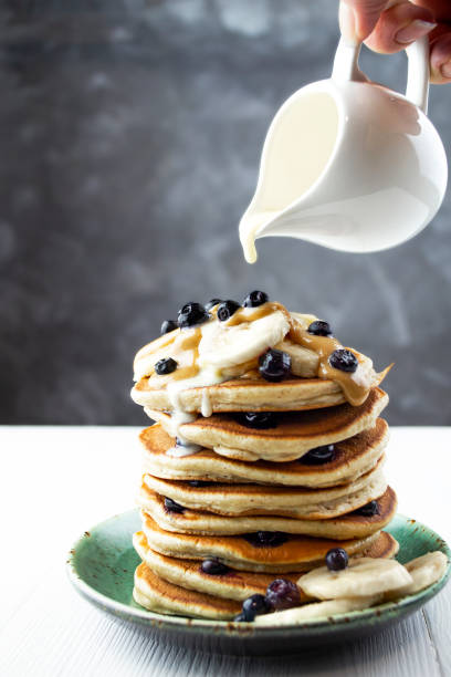 istock Breakfast concept. Vegan pancakes with vegetable condensed milk. 1302813950