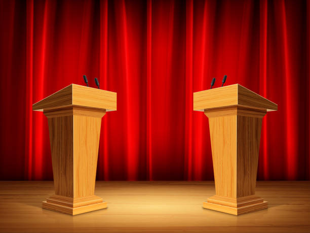 istock Two wooden podium and red curtain on the stage 1302814775