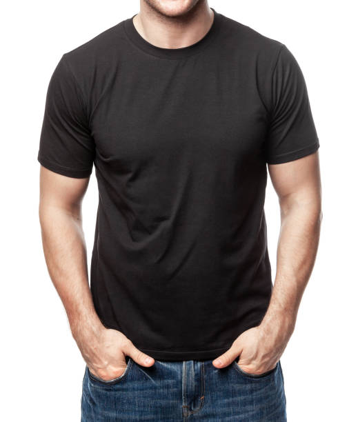 Blank black tshirt on young man template on white background Young fit man wearing blank black shortsleeve cotton T-Shirt. Mock up template isolated on a white background T Shirt stock pictures, royalty-free photos & images