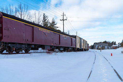 Waterloo Central Railway at winter in St. Jacobs, Ontario, Canada. \nThe Waterloo Central Railway is a non-profit heritage railway that is owned and operated by the Southern Ontario Locomotive Restoration Society.