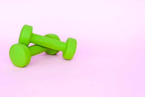 istock A green apple, and a centimeter measuring tape 1302818012