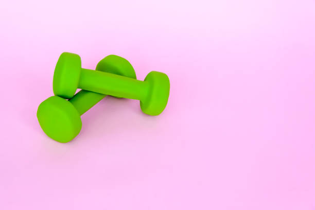 istock A green apple, and a centimeter measuring tape 1302818073