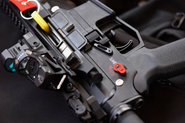 istock Close-up machine gun is placed in a function position in a safe position. Within the shooting range 1302819238