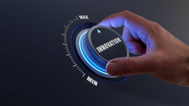 istock Enhancing innovation and technology development concept with a person choosing higher innovative products by turning a knob or dial by hand. Business strategy about engineering and research. 1302820658