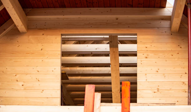 istock Wooden house on construction site 1302821014