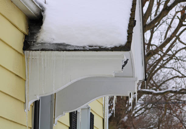 istock House with Icicles in Winter 1302821983