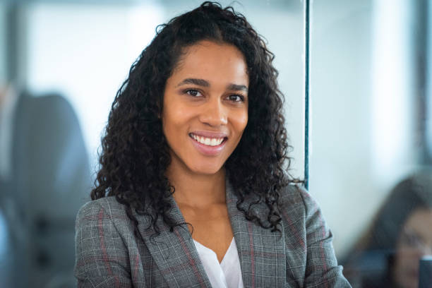 istock Successful young business woman looking at camera 1302821991