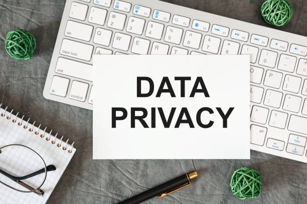 istock DATA PRIVACY is written in a document on the office desk 1302822093