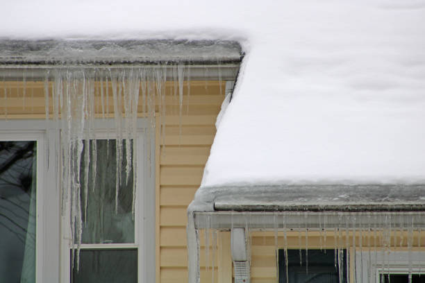 istock House with Icicles in Winter 1302822186